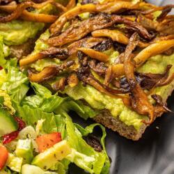 Elysian Restaurant Vegan Dishes Open Avocado And Mushroom Sandwich