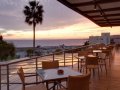 st raphael resort captains bar terrace sunset