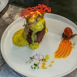 Andria Restaurant Steakhouse Angus Steak With Abocado Fetta Cheese And Bearnaise Sauce